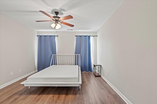 3382 Grove Landing Cir, Grovetown, GA 30813 - bedroom featuring wood finished floors and ceiling fan