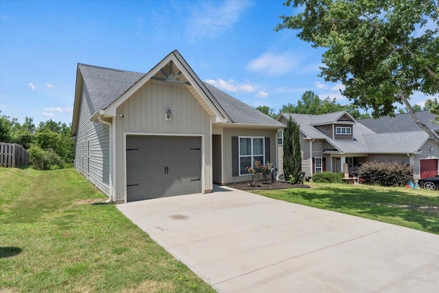 3382 Grove Landing Cir, Grovetown, GA 30813 - ranch-style house with an attached garage, concrete driveway, a front yard, and board and batten siding
