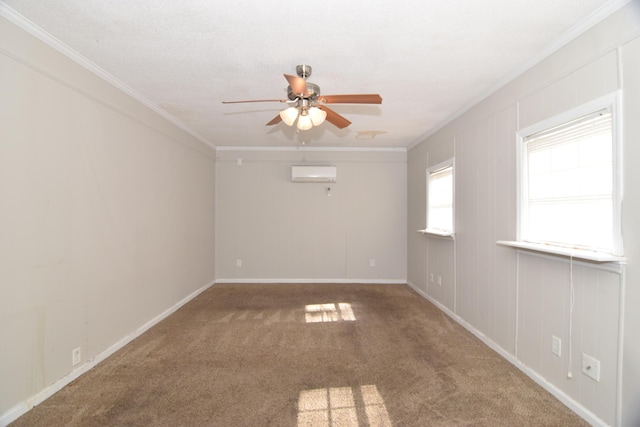 empty room featuring carpet floors, a wall unit AC, a ceiling fan, and crown molding