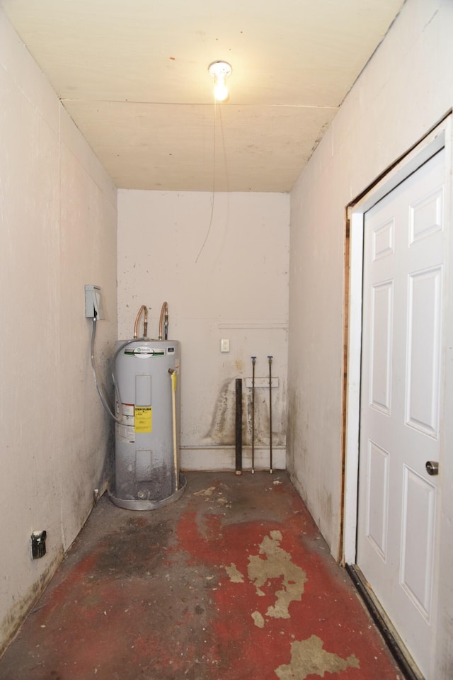 below grade area featuring water heater