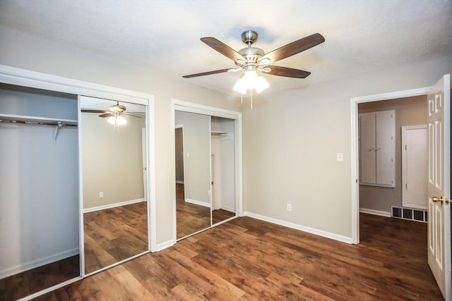 4552 Bettys Branch Way, Evans, GA 30809 - unfurnished bedroom with ceiling fan, visible vents, wood finished floors, baseboards, and multiple closets