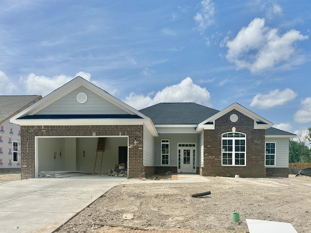 1224 Elbron Dr, Augusta, GA 30909 - view of front facade featuring brick siding, a garage, and driveway