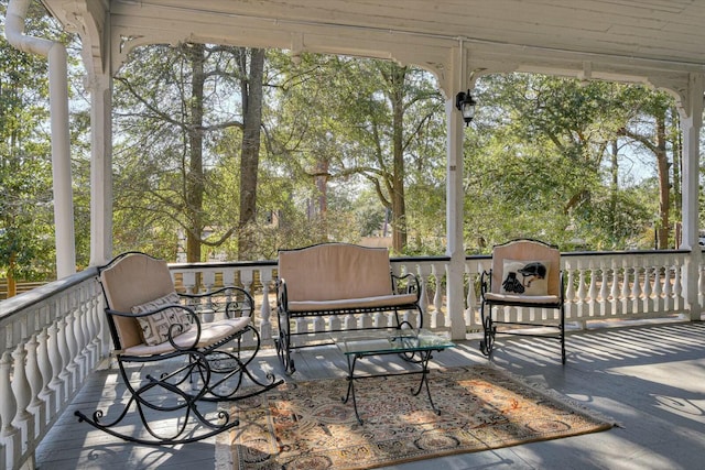 sunroom / solarium featuring a healthy amount of sunlight