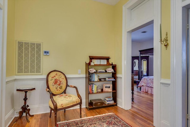 sitting room featuring light wood-type flooring