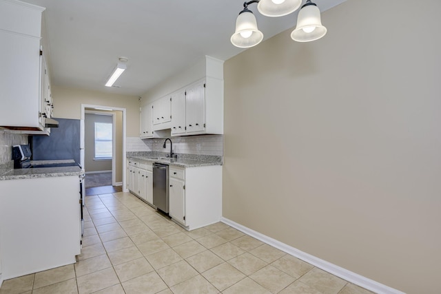 3831 Highpointe Dr, Hephzibah, GA 30815 - kitchen featuring stainless steel dishwasher, stove, tasteful backsplash, white cabinetry, and light tile patterned floors
