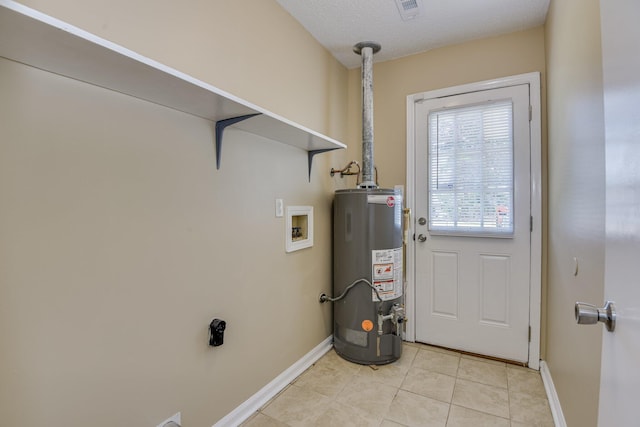 3831 Highpointe Dr, Hephzibah, GA 30815 - laundry room with water heater, washer hookup, and light tile patterned floors