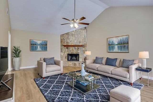3831 Highpointe Dr, Hephzibah, GA 30815 - living room featuring ceiling fan, wood finished floors, high vaulted ceiling, and a fireplace