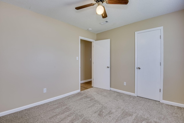 3831 Highpointe Dr, Hephzibah, GA 30815 - unfurnished bedroom with carpet floors and a ceiling fan