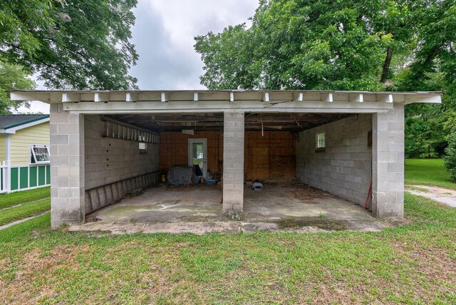 view of vehicle parking featuring a yard