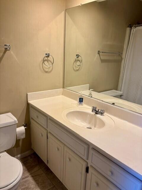 2949 Hillcreek Dr, Augusta, GA 30909 - full bath featuring toilet, vanity, a shower with curtain, and baseboards