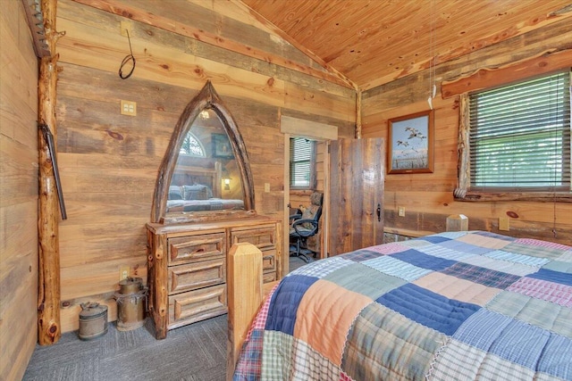 bedroom with lofted ceiling, wood walls, and wood ceiling