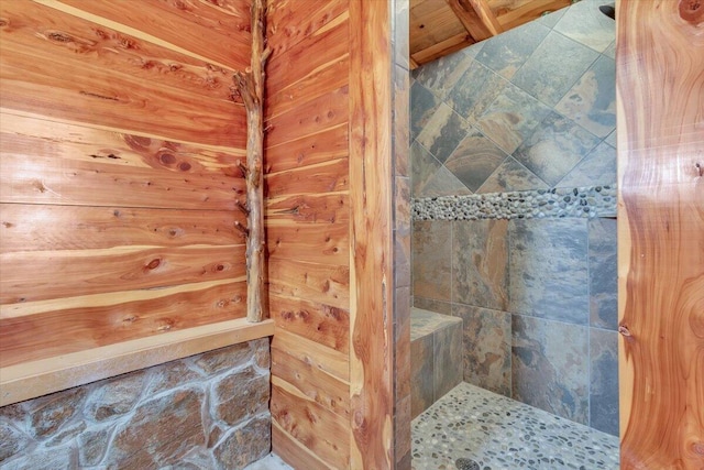 bathroom with tiled shower