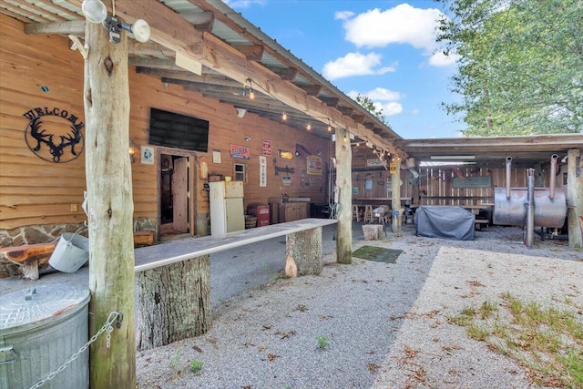 view of property exterior featuring an outbuilding