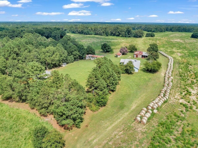 birds eye view of property with a rural view