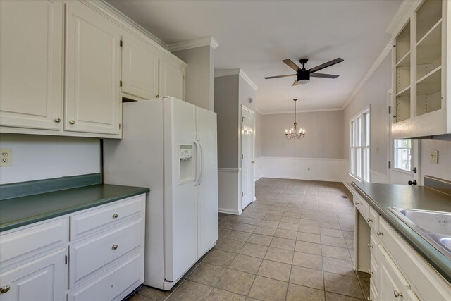 227 Water Oak Dr, Augusta, GA 30904 - dining room with a chandelier, ceiling fan, ornamental molding, and stairway