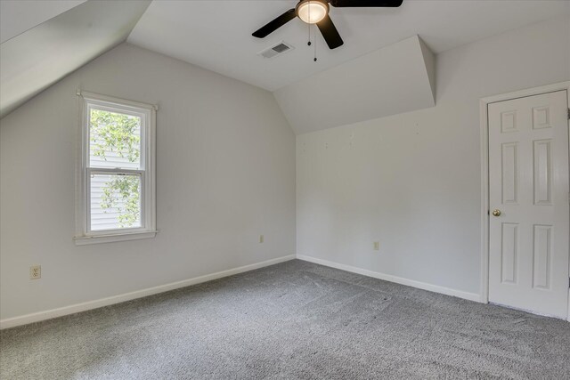 227 Water Oak Dr, Augusta, GA 30904 - bedroom with multiple windows, carpet floors, baseboards, and lofted ceiling