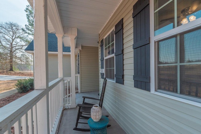 view of property exterior with a porch