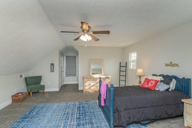 carpeted bedroom featuring ceiling fan, lofted ceiling, and a textured ceiling