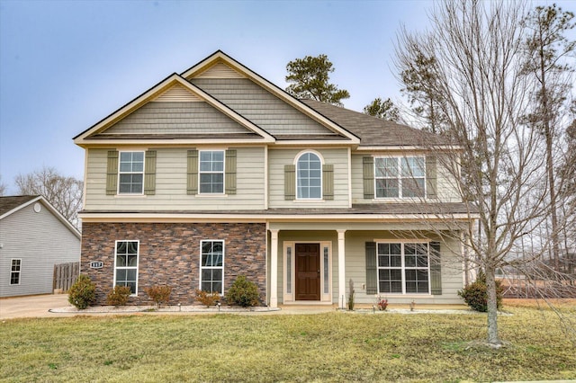 view of front of home featuring a front lawn