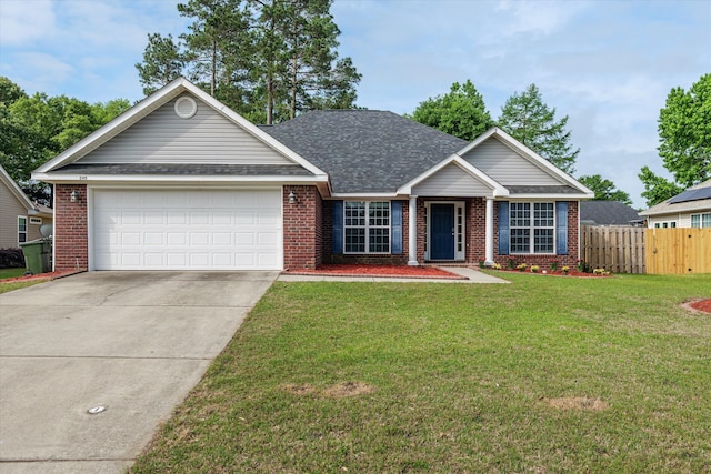 view of front of property featuring brick siding, an attached garage, fence, and driveway