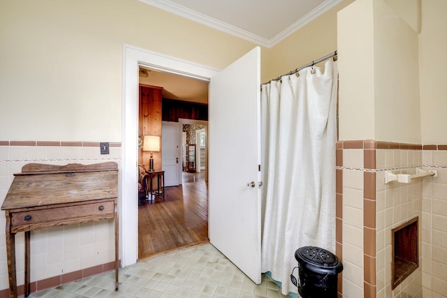 1203 Highland Ave, Augusta, GA 30904 - bathroom with tile walls, ornamental molding, wainscoting, and tile patterned floors