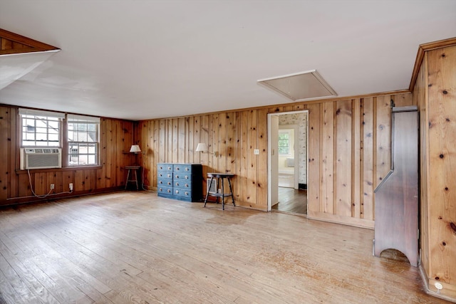 1203 Highland Ave, Augusta, GA 30904 - unfurnished room with cooling unit, attic access, healthy amount of natural light, wood-type flooring, and wood walls