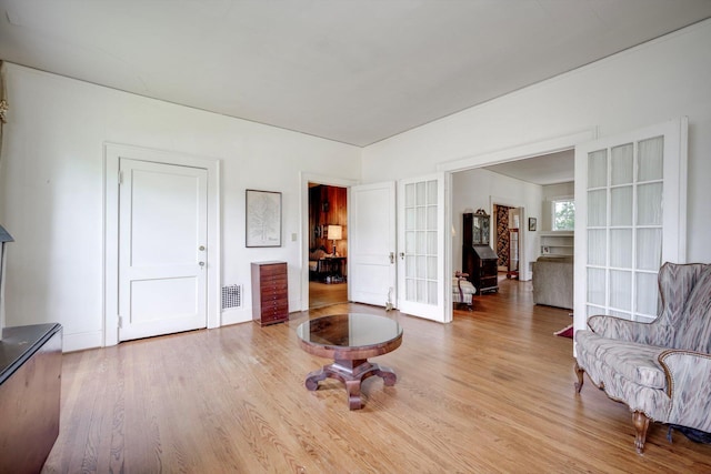 1203 Highland Ave, Augusta, GA 30904 - sitting room featuring french doors and wood finished floors