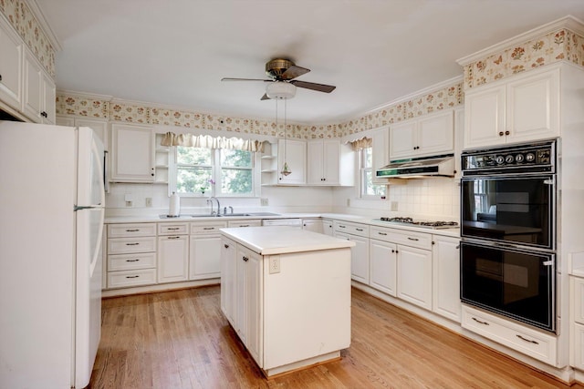 1203 Highland Ave, Augusta, GA 30904 - kitchen featuring white appliances, under cabinet range hood, open shelves, ceiling fan, and healthy amount of natural light