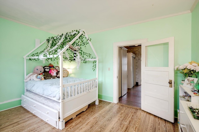 1203 Highland Ave, Augusta, GA 30904 - bedroom featuring ornamental molding and wood finished floors
