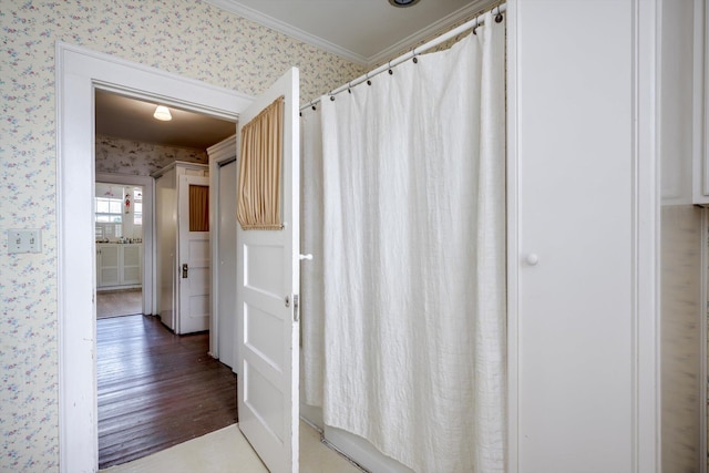 1203 Highland Ave, Augusta, GA 30904 - full bath with wallpapered walls, wood finished floors, crown molding, and a shower with curtain