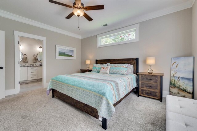 carpeted bedroom featuring ceiling fan, ornamental molding, and connected bathroom