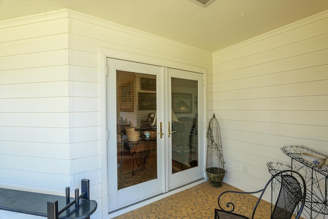 property entrance featuring french doors