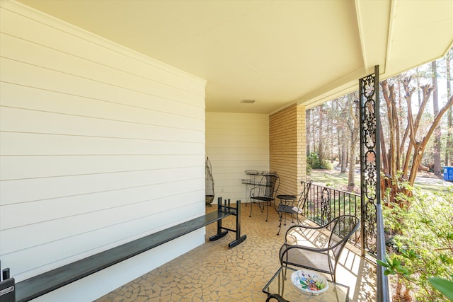 view of patio featuring visible vents