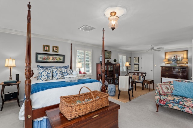 carpeted bedroom featuring ornamental molding