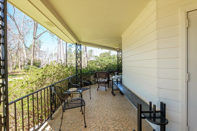 view of patio / terrace with a balcony