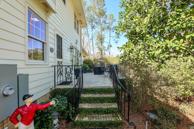 exterior space with a patio area and fence