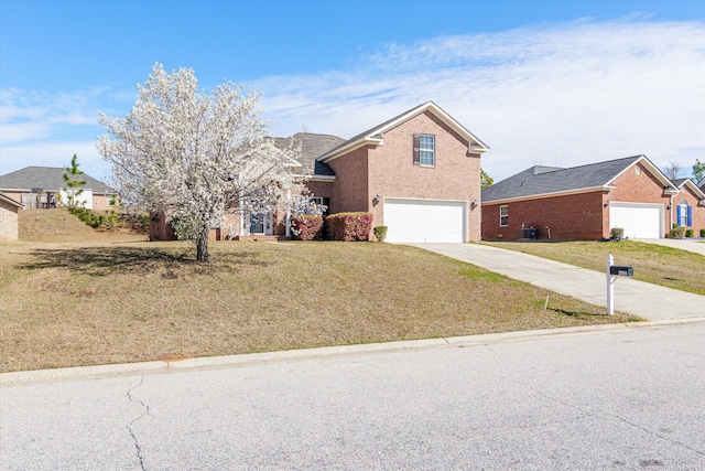 view of front of home with a garage, driveway, a front lawn, and cooling unit