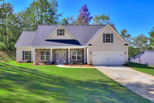 view of front facade featuring a garage and a front lawn