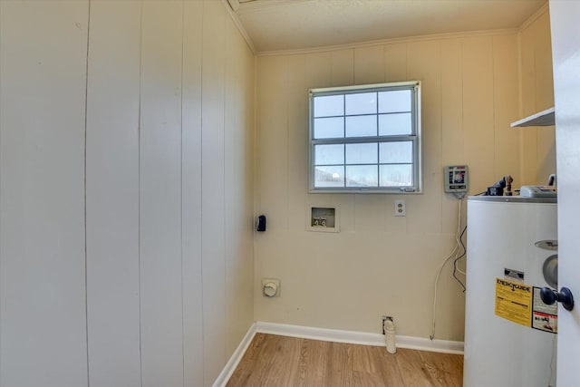 laundry room with hookup for a washing machine, laundry area, water heater, light wood-type flooring, and crown molding