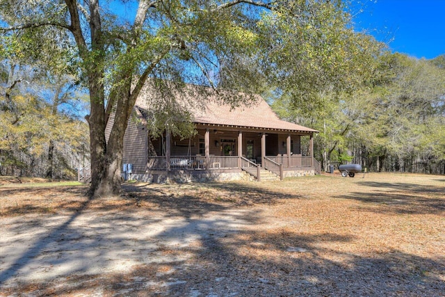 view of front of home featuring covered porch