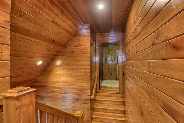 interior space featuring lofted ceiling, wooden ceiling, wood walls, and recessed lighting