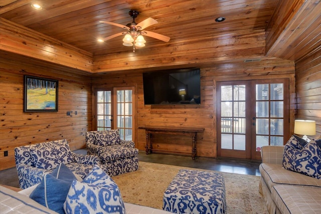 living area with french doors, wooden ceiling, and a healthy amount of sunlight