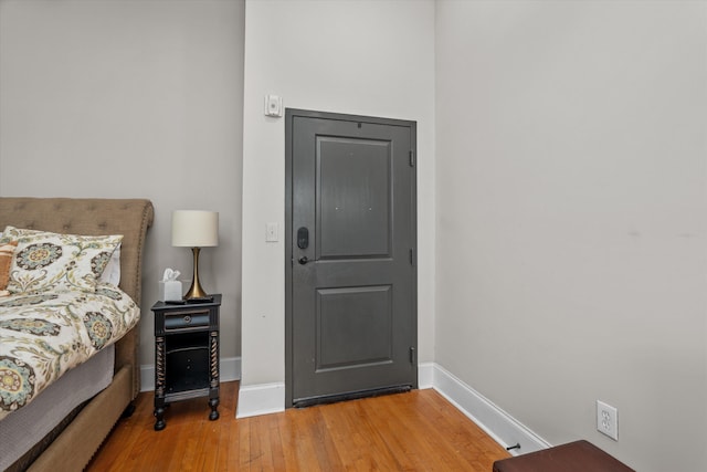 936 Broad St # 415, Augusta, GA 30901 - bedroom featuring baseboards and light wood-type flooring