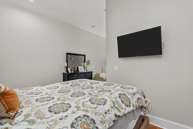936 Broad St # 415, Augusta, GA 30901 - bedroom featuring baseboards and wood finished floors
