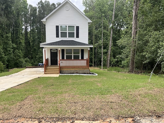 view of front of house featuring a front yard and a porch