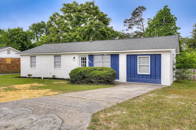 2505 Blackstone St, Augusta, GA 30906 - ranch-style home featuring brick siding, roof with shingles, and a front yard