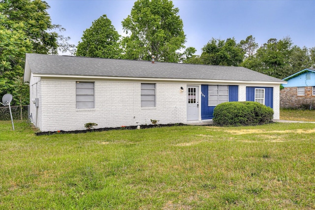 2505 Blackstone St, Augusta, GA 30906 - ranch-style home with brick siding, a shingled roof, fence, and a front yard