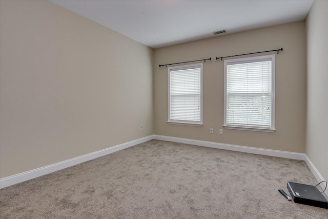 207 Oleander Trl, Evans, GA 30809 - carpeted spare room with baseboards