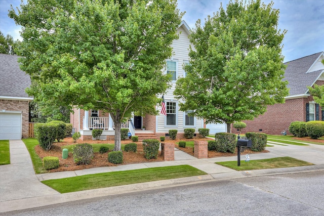 207 Oleander Trl, Evans, GA 30809 - obstructed view of property featuring a porch and driveway
