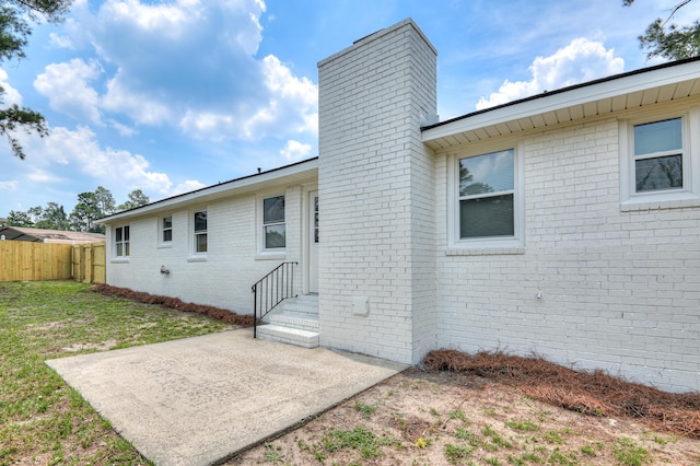 4075 Flintrock Way, Martinez, GA 30907 - back of house featuring a chimney, brick siding, a patio area, and entry steps